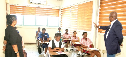Ato Afful (right), Managing Director of the Graphic Communications Group Limited, sharing a thought with the contestants. Looking on is Hanna Amoah, the Editor of the Junior Graphic
